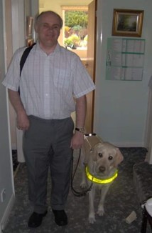 David Boden pictured with his guide dog